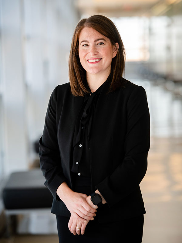 Emily Anstaett, Hayes Law Attorney in Columbus, Ohio wearing a suit in the courthouse